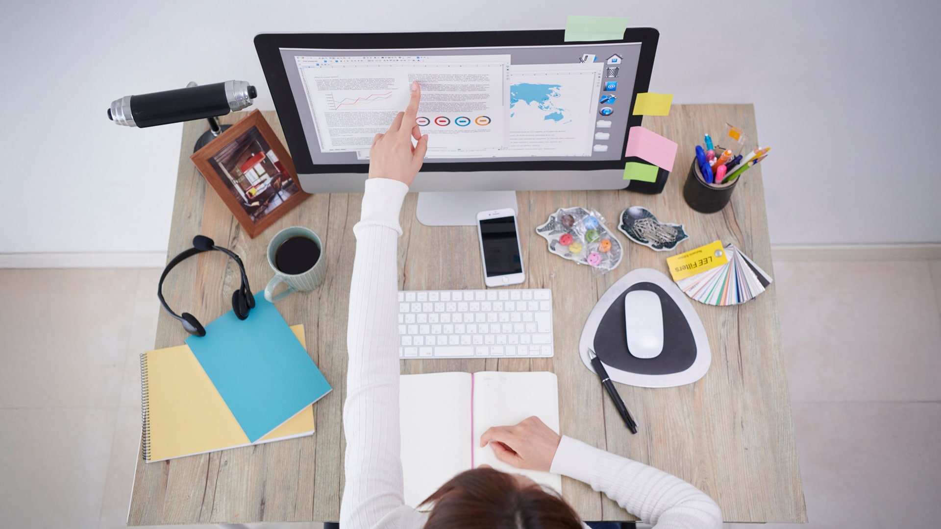 Desk filled with office productivity essentials