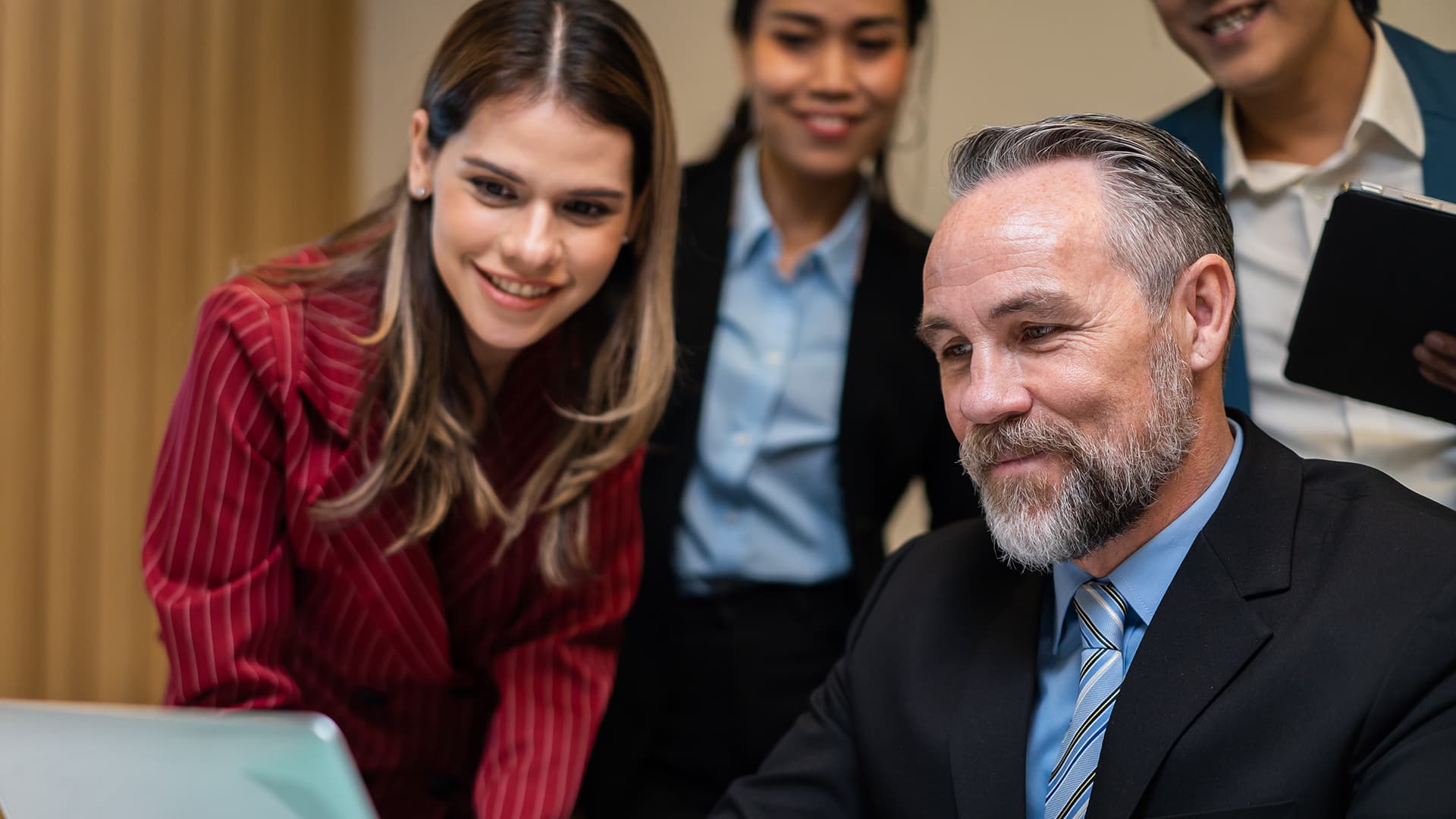 Diverse professionals collaborating with Microsoft Teams for financial firms