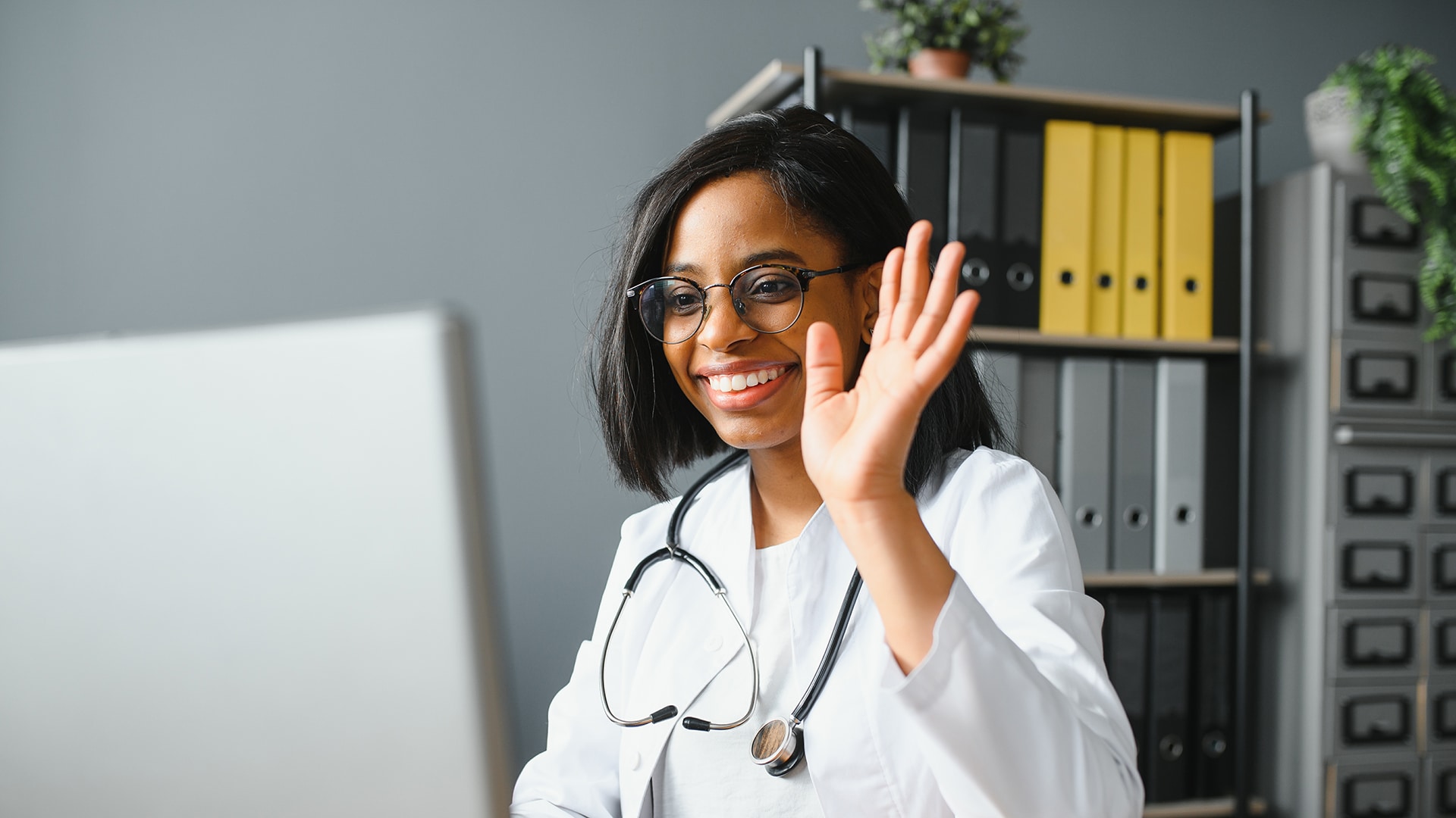 Smiling doctor using Microsoft Teams Phone for healthcare